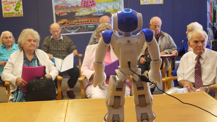 Alice the robot charges up for the Madeley singing group