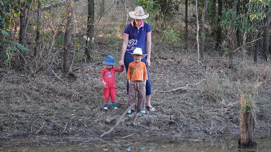 Tracy near the dam in Bundaberg with her children.
