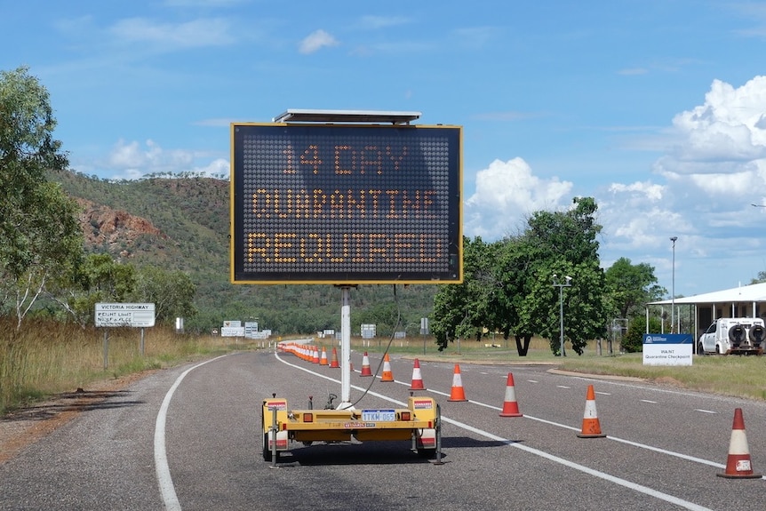 A sign at the border checkpoint warning travellers of restrictions