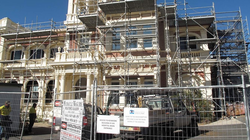 Heritage-listed building Kenmore House is covered in scaffolding.