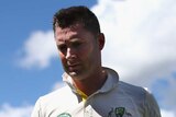 Australian captain Michael Clarke leaves the ground after being dismissed at Old Trafford for 187.