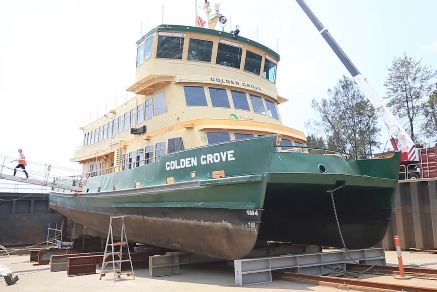 The Golden Grove ferry out of the water and being worked on in the Port Macquarie shipyard.