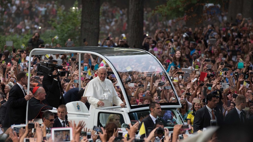Pope Francis rides through Central Park in the "Popemobile" on September 25, 2015 in New York City.