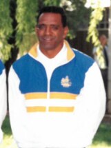 A man in a white and blue jacket.