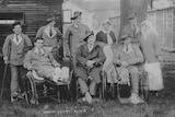 Black and white image of wounded soldiers and nurses in 1918.