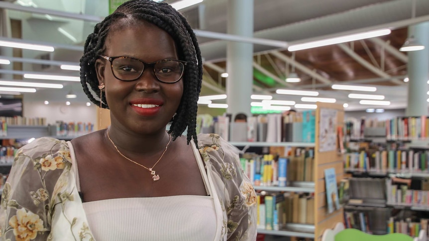 Woman standing in library