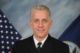 Retired Rear Admiral Bruce Loveless in portrait photograph