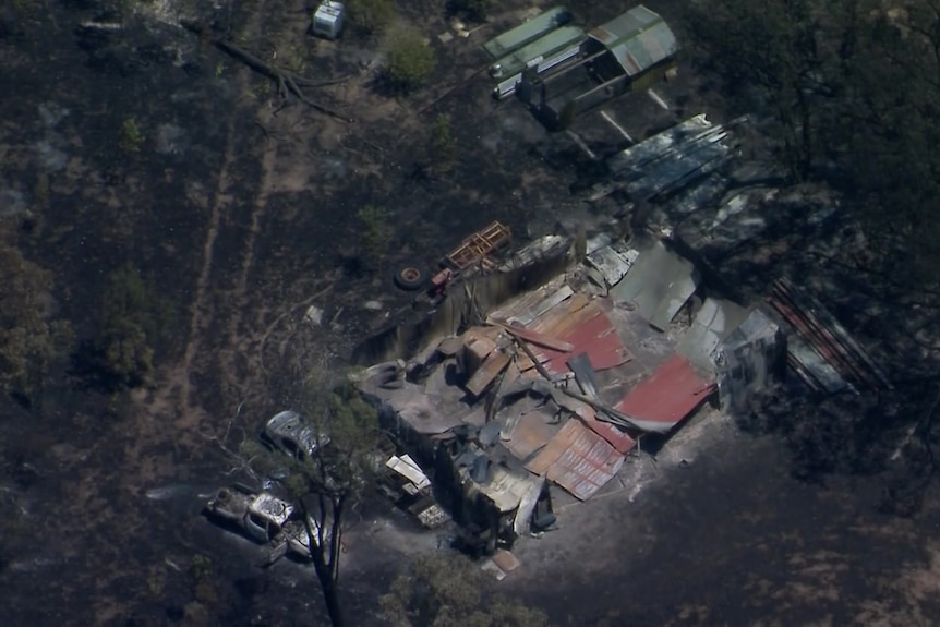 burned out buildings in the bush seen from above