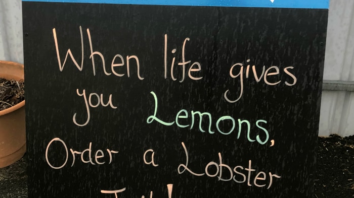 Sign at Port MacDonnell crayfish processing centre, saying: "When life gives you lemons, order a lobster tail".