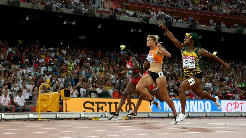 Shelly-Ann Fraser-Pryce of Jamaica beats Dutch sprinter Dafne Schippers to win the women's 100m at world athletics championships