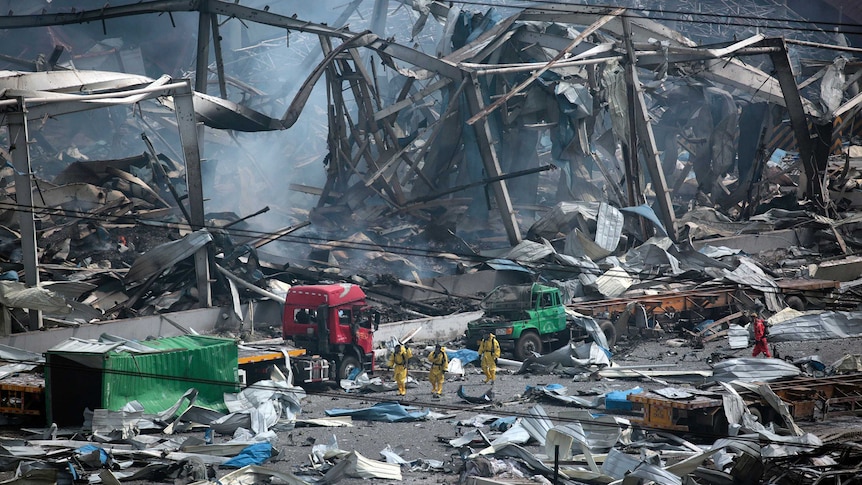 Rescue workers at site of Tianjin explosions