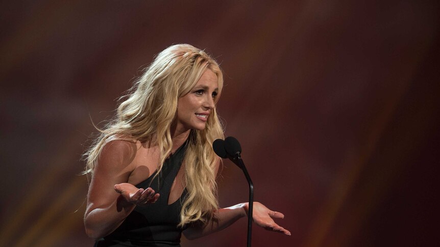 Portrait of Britney Spears delivering a speech