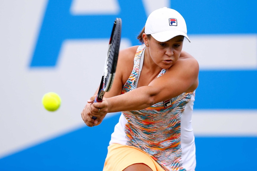 Ashleigh Barty plays a backhand against Petra Kvitova in the final of the Birmingham WTA Tour event.