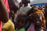 Liberian children at Christmas party run through funds from NGOs