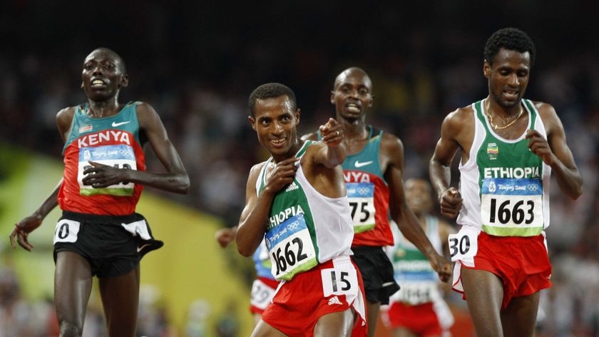 Kenenisa Bekele celebrates winning the men's 10,000m final at the Beijing Olympic