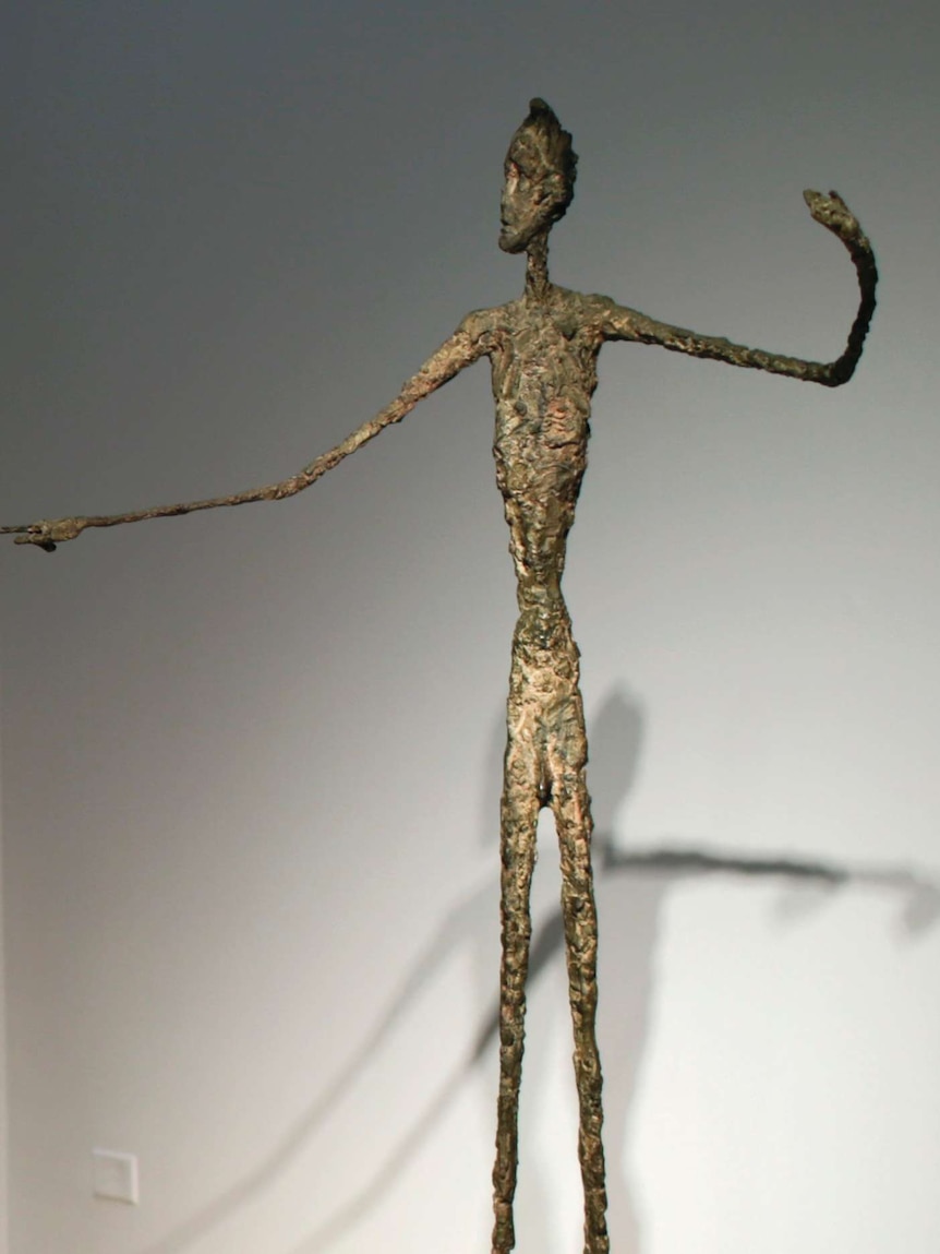Alberto Giacometti's statue Man Pointing sells for record $141m
