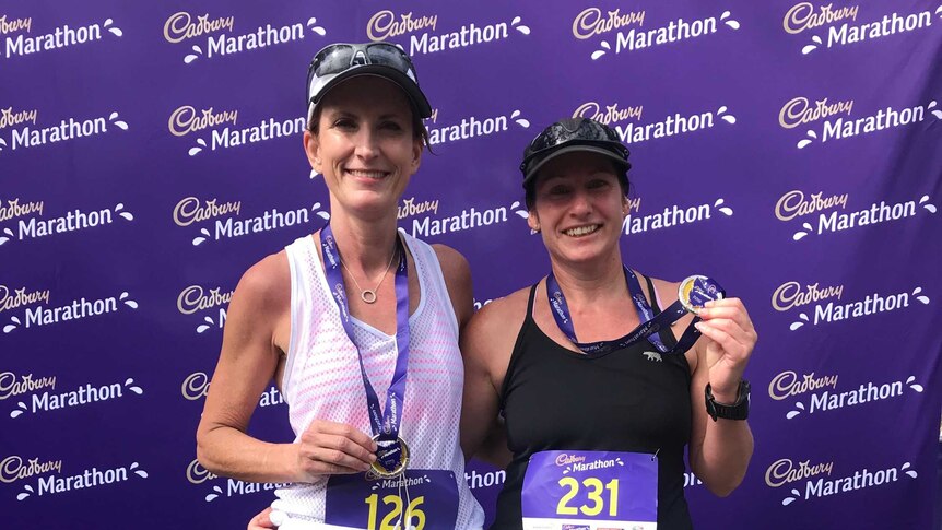 Kathy Fuller and Narelle Pell after competing in a marathon in Melbourne this morning