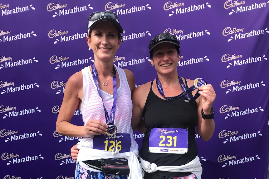 Kathy Fuller and Narelle Pell after competing in a marathon in Melbourne this morning