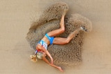 Darya Klishina lands in the sand
