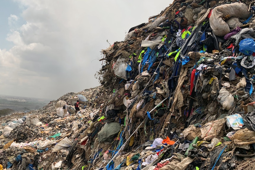 A mountain of clothing in a landfill site in Ghana's capital Accra.