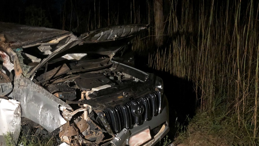 The wreckage of a crashed Toyota Prado