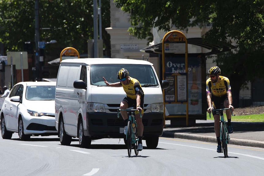 Cyclists change lanes in Adelaide