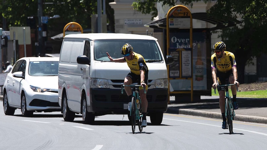 Cyclists change lanes in Adelaide