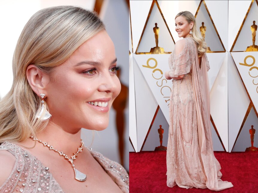 Abbie Cornish wears gold, flowing sparkling dress on the red carpet