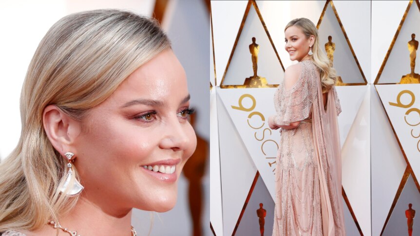 Abbie Cornish wears gold, flowing sparkling dress on the red carpet