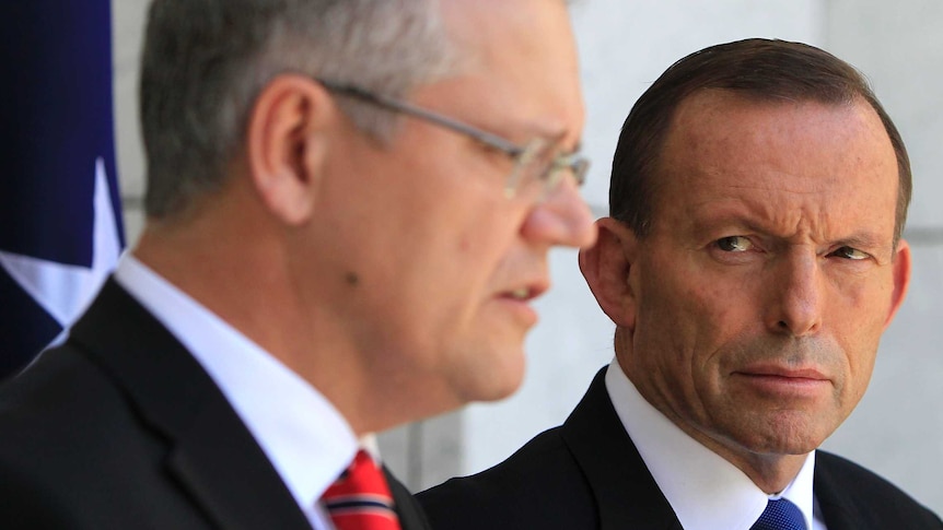 Prime Minister Tony Abbott and Minister for Immigration Scott Morrison during a press conference.