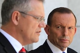 Prime Minister Tony Abbott and Minister for Immigration Scott Morrison during a press conference.