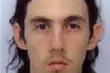 Richard Huckle a criminal paedophile  pictured with long dark hair.