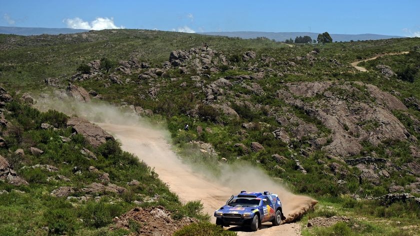 Carlos Sainz takes on the first stage in his Volkswagen.