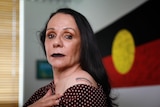 A tattoo of the Aboriginal flag can be seen on Linda Burney's upper arm.