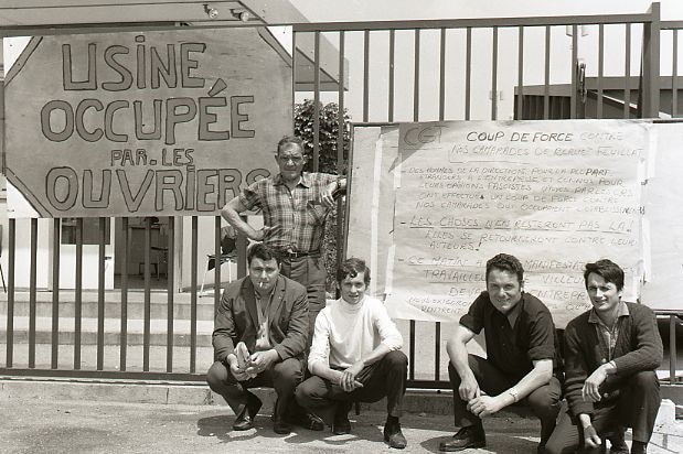 Strikers in Southern France with a sign reading "Factory Occupied by the Workers."