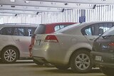 Parking could cost $6 per day more, report argues