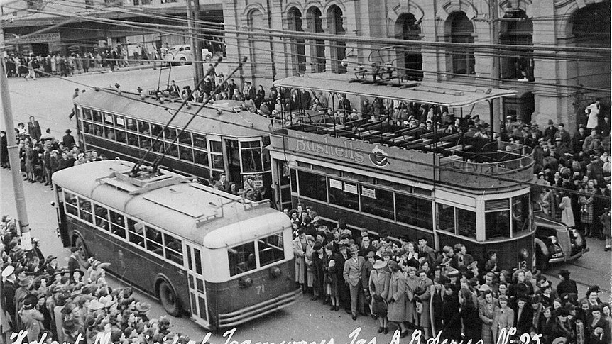 Old photo of trams and a trolley bus in Hobart.