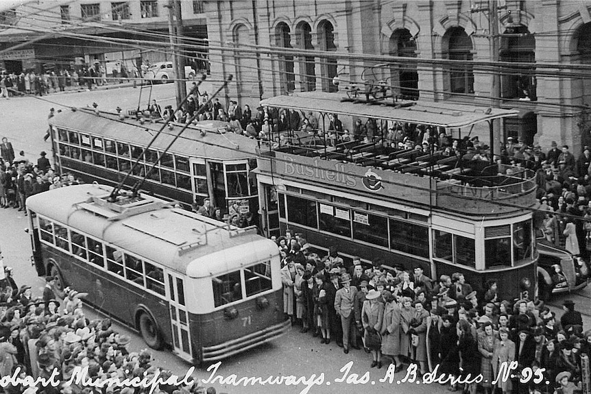 Old photo of trams and a trolley bus in Hobart.