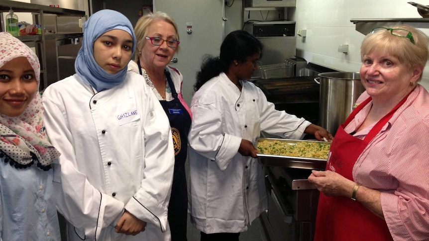 CWA members and asylum seekers at a session of Community Kitchen