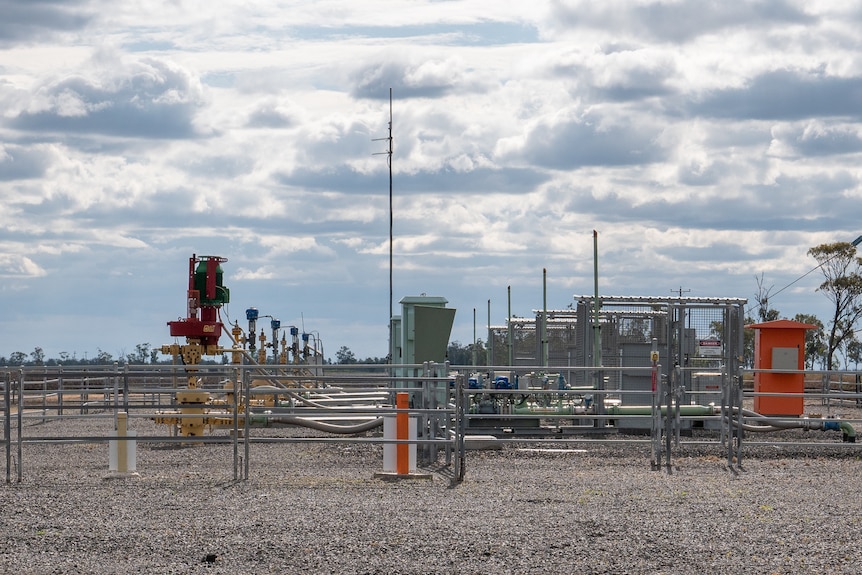 Multiple coal seam gas wells surrounded by a fence south of Dalby, October 2022.