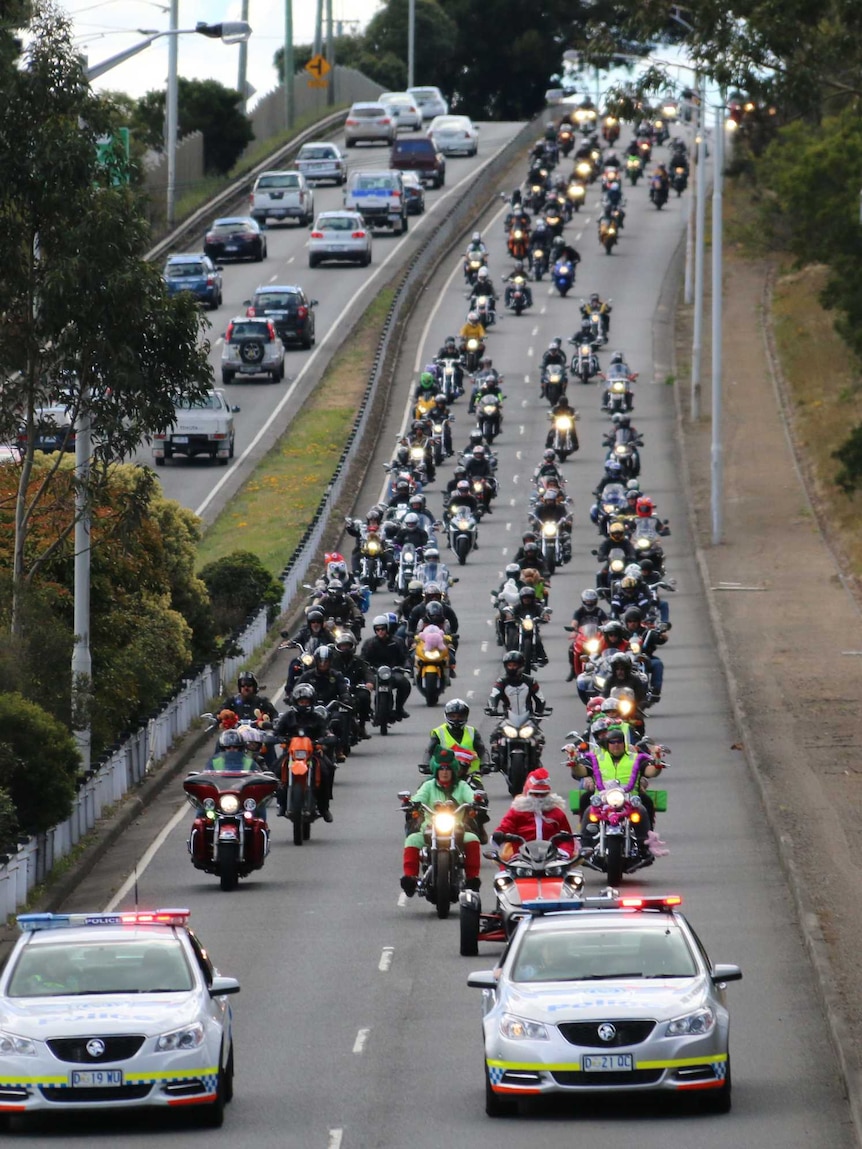 Motorcycle riders enter Hobart on the annual toy run