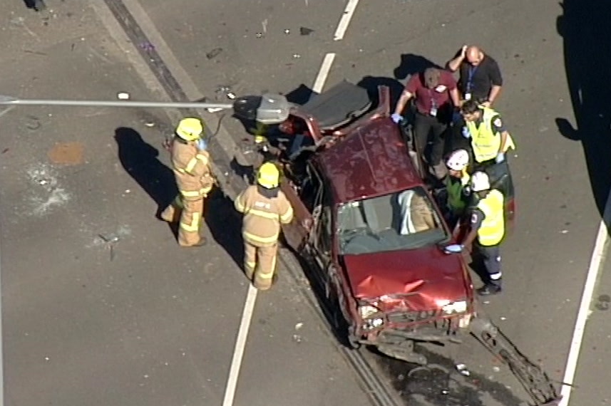 An aerial shot of emergency services attending to one of the cars involved in the crash.