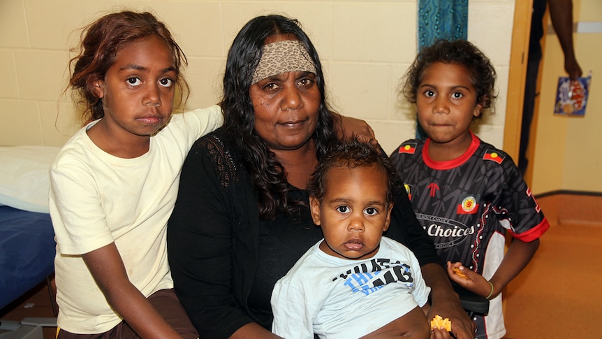 Forty-six-year-old grandmother Vanessa Wallace with her three grandchildren.