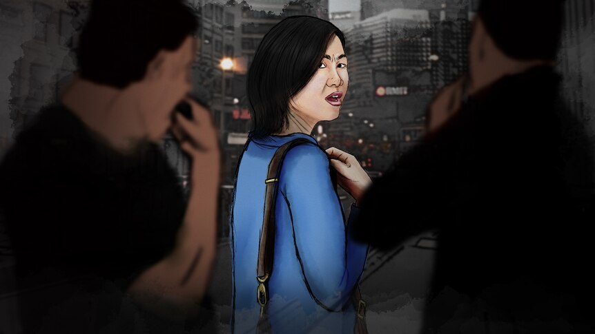 A graphic of a woman of Asian appearance being harassed by two men from behind her.