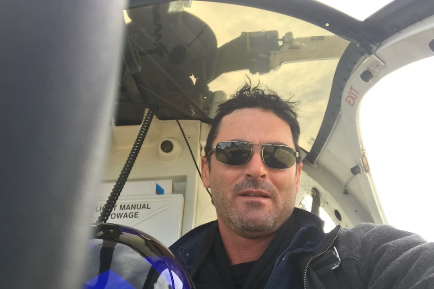 Pilot inside helicopter