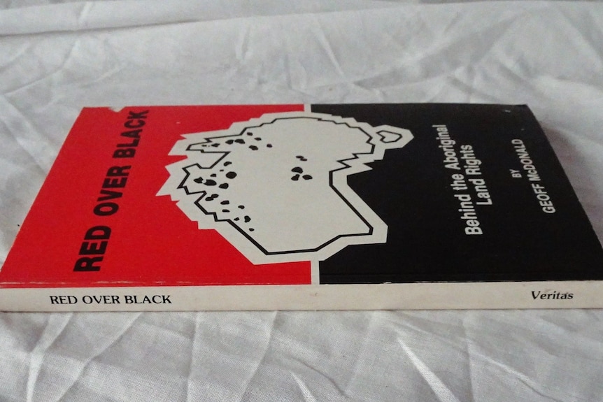 A copy of the book Red Over Black by Geoff McDonald.