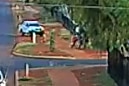 A CCTV image shows a ute driving at young children