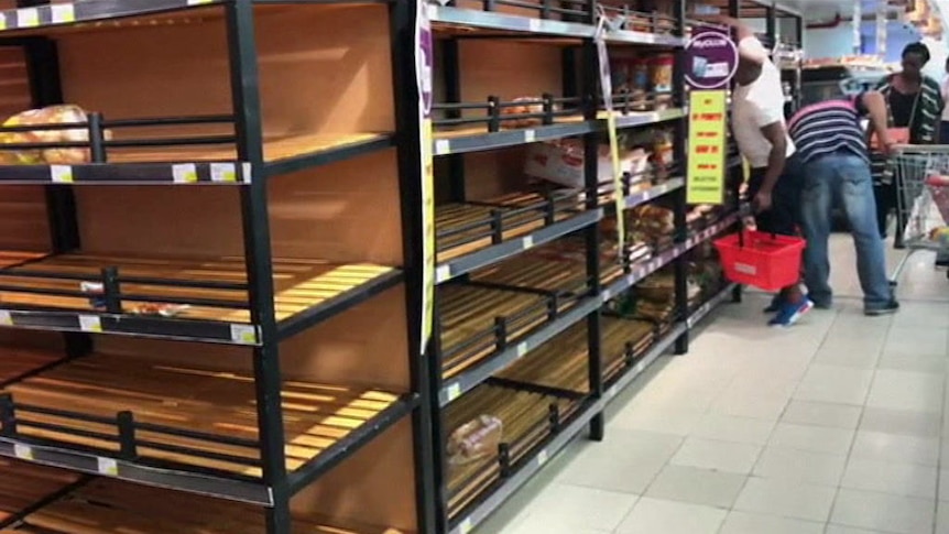 Supermarket shelves in Qatar empty as residents stock-pile food