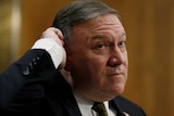Mike Pompeo scratches his head