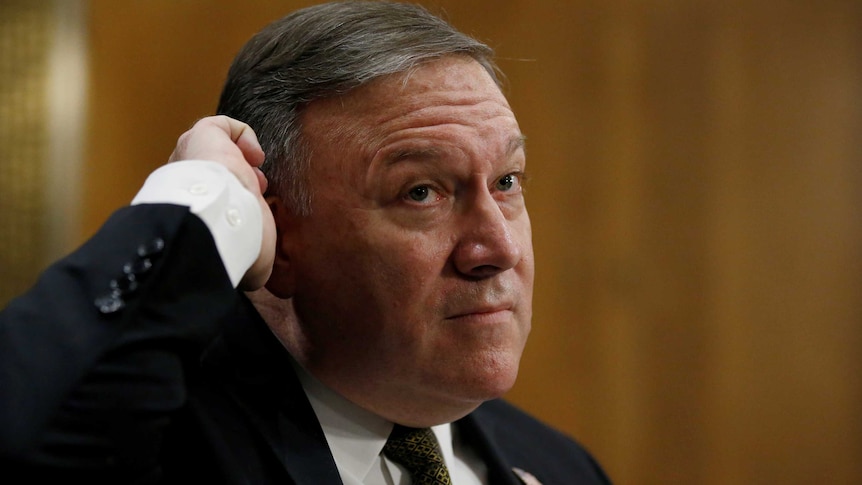 Mike Pompeo scratches his head